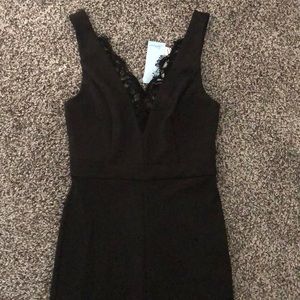 Black v-neck jumpsuit.